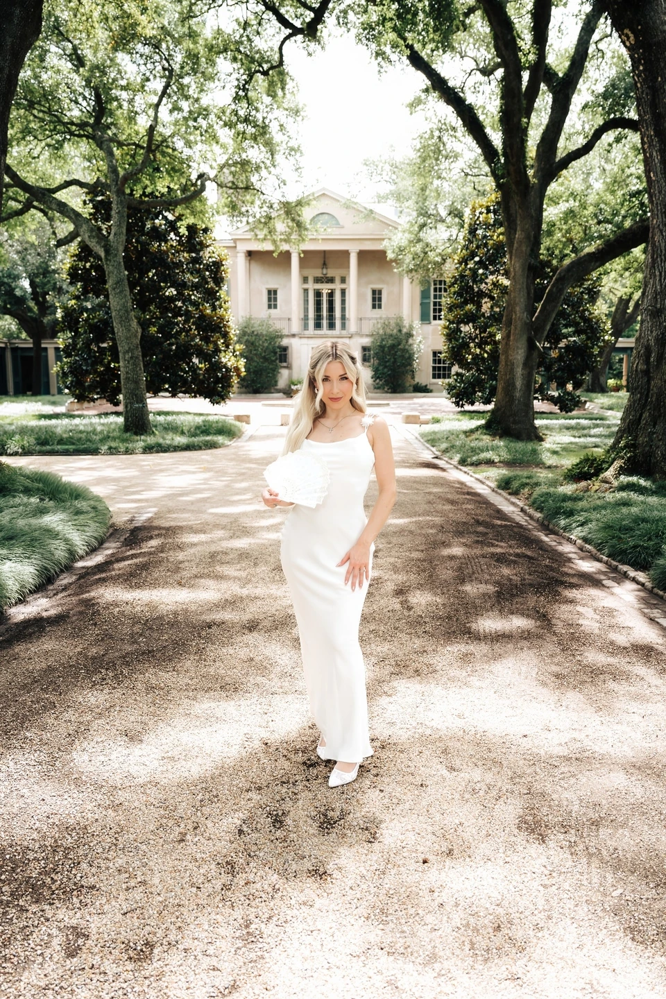 Portrait of Gina, Founder & Master Stylist at The Beauty Society by Gina